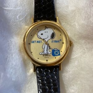 Rare and vintage Snoopy watch with original leather strap.
